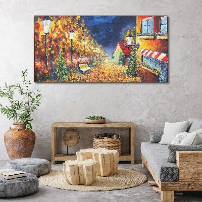 Tableau sur toile Avenue dorée à la lueur des lanternes
