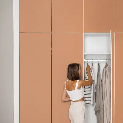 Film adhésif décoratif pour meuble orange pastel