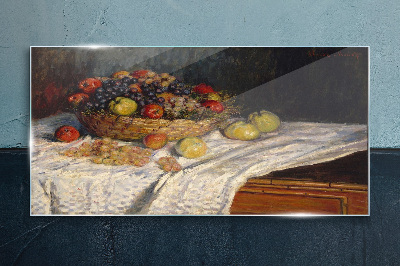 Tableau imprimé sur verre Corbeille de fruits sur une nappe blanche
