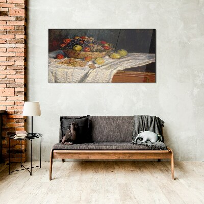 Tableau imprimé sur verre Corbeille de fruits sur une nappe blanche