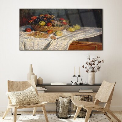 Tableau imprimé sur verre Corbeille de fruits sur une nappe blanche