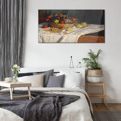 Tableau imprimé sur verre Corbeille de fruits sur une nappe blanche
