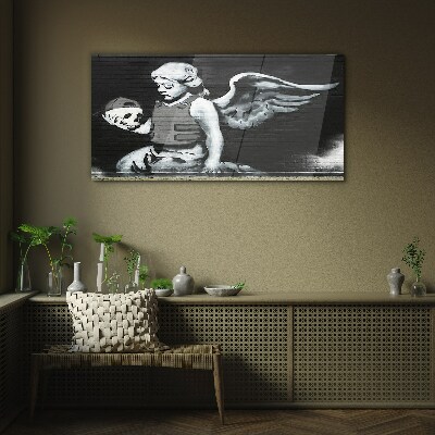 Tableau photo sur verre Un ange avec un crâne sur un fond de graffiti