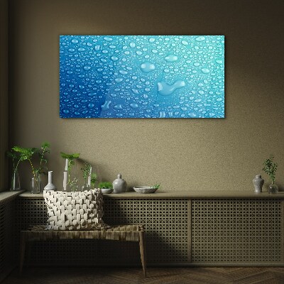 Tableau verre imprimé Gouttes d'eau sur fond bleu
