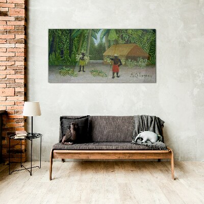 Tableau imprimé sur verre Récolte de bananes dans un paysage tropical