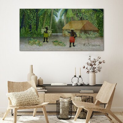 Tableau imprimé sur verre Récolte de bananes dans un paysage tropical