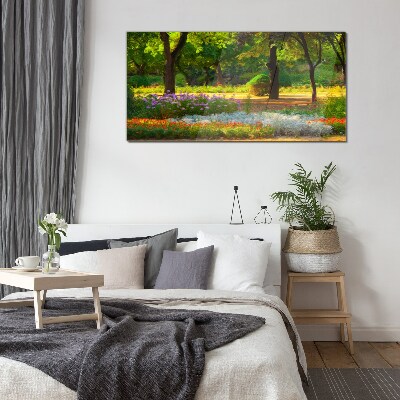 Tableau imprimé sur verre Un paradis de fleurs dans un jardin ensoleillé