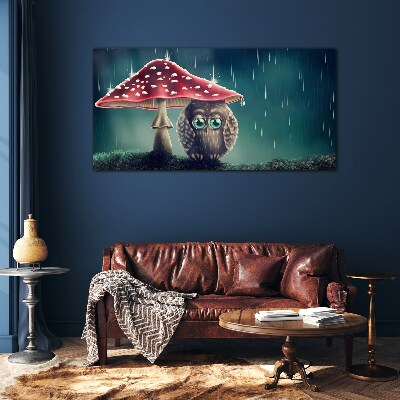 Tableau sur verre Un hibou sous un champignon sous la pluie