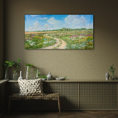 Tableau verre imprimé Un chemin fleuri parmi les prairies