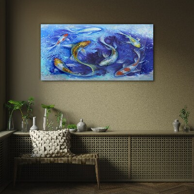 Tableau imprimé sur verre La danse de la carpe dans l'eau bleue