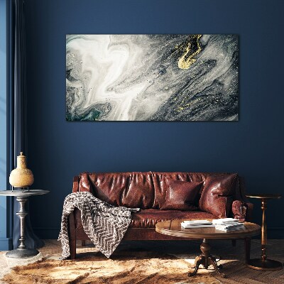 Tableau photo sur verre Des traînées dorées dans les profondeurs de la mer