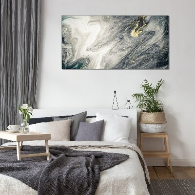 Tableau photo sur verre Des traînées dorées dans les profondeurs de la mer