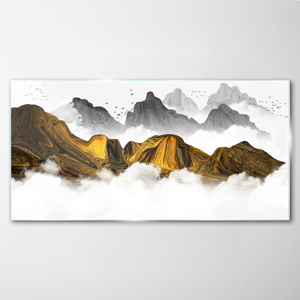 Tableau verre imprimé Des montagnes dorées dans les nuages
