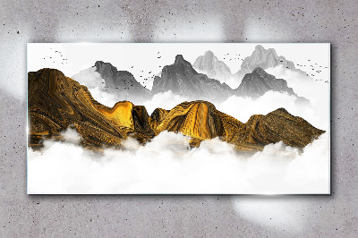 Tableau verre imprimé Des montagnes dorées dans les nuages