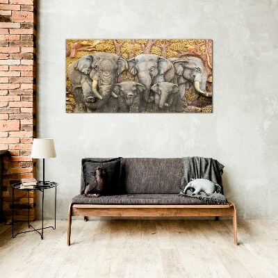 Tableau en verre Une famille d'éléphants dans un paysage forestier