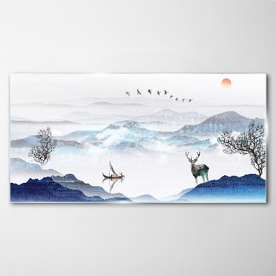 Tableau sur verre Un paysage de montagne paisible avec un cerf