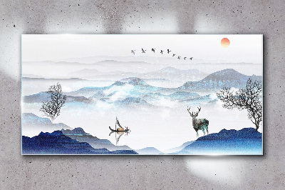 Tableau sur verre Un paysage de montagne paisible avec un cerf