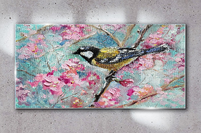 Tableau en verre Chant d'oiseau printanier sur une branche