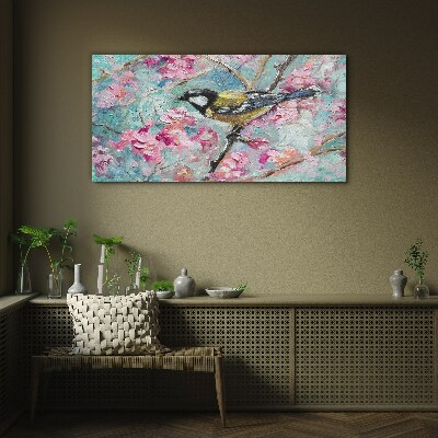 Tableau en verre Chant d'oiseau printanier sur une branche