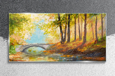 Tableau imprimé sur verre Un pont dans la forêt d'automne