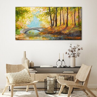 Tableau imprimé sur verre Un pont dans la forêt d'automne