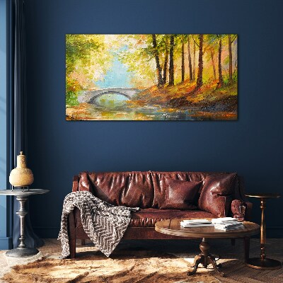 Tableau imprimé sur verre Un pont dans la forêt d'automne