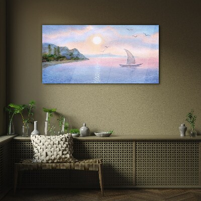 Tableau photo sur verre Un paysage paisible de coucher de soleil sur la mer