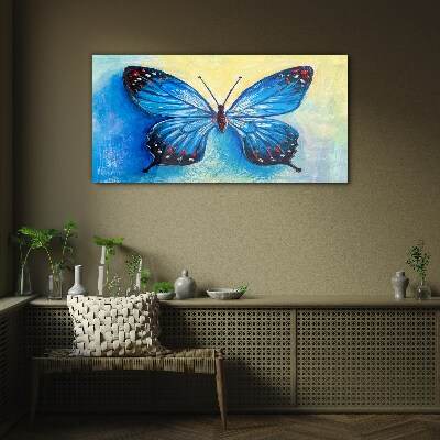 Tableau photo sur verre Papillon bleu sur fond abstrait