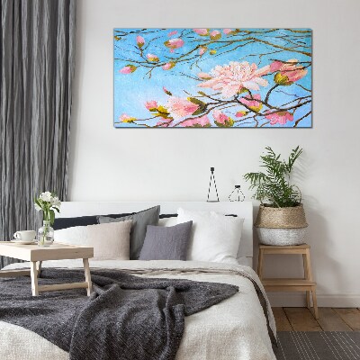 Tableau photo sur verre Fleurs de magnolia sur fond bleu