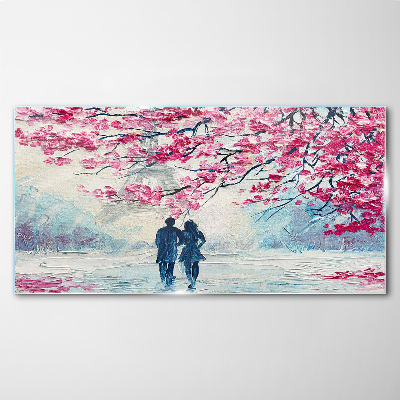 Tableau sur verre Une promenade printanière sous les arbres en fleurs