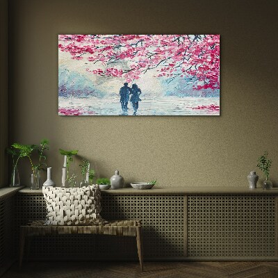 Tableau sur verre Une promenade printanière sous les arbres en fleurs
