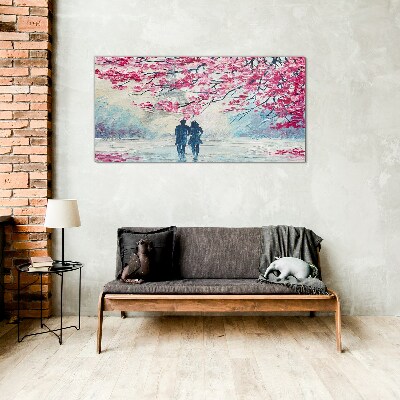 Tableau sur verre Une promenade printanière sous les arbres en fleurs