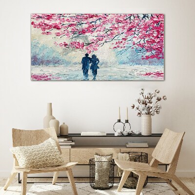 Tableau sur verre Une promenade printanière sous les arbres en fleurs