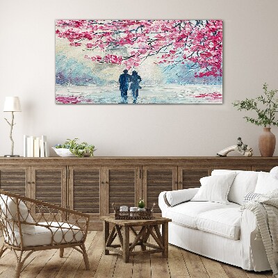 Tableau sur verre Une promenade printanière sous les arbres en fleurs