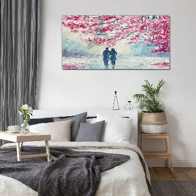 Tableau sur verre Une promenade printanière sous les arbres en fleurs