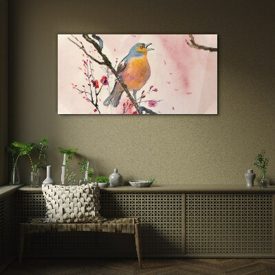 Tableau sur verre Un oiseau chanteur dans un paysage printanier