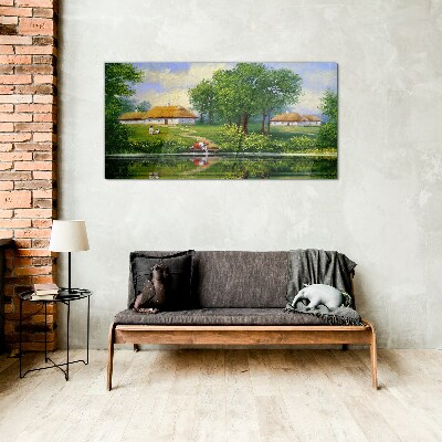 Tableau verre imprimé Un paysage rural paisible au bord de l'eau