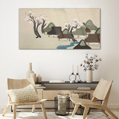 Tableau imprimé sur verre Un paysage paisible avec des maisons et des arbres