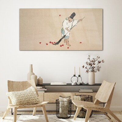 Tableau photo sur verre Moine nettoyant avec des feuilles