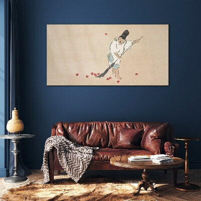 Tableau photo sur verre Moine nettoyant avec des feuilles