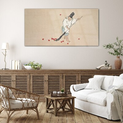 Tableau photo sur verre Moine nettoyant avec des feuilles