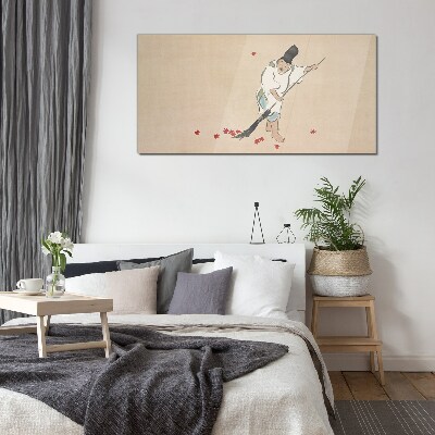 Tableau photo sur verre Moine nettoyant avec des feuilles