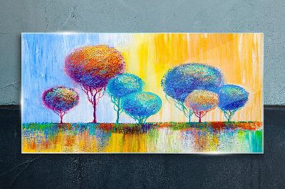 Tableau imprimé sur verre Arbres colorés dans la lumière du coucher du soleil