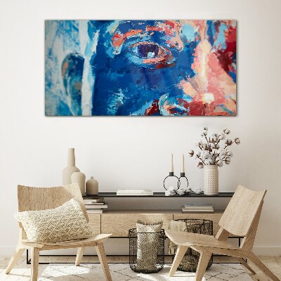 Tableau sur verre Visage intense aux nuances bleues