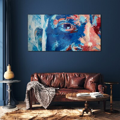 Tableau sur verre Visage intense aux nuances bleues