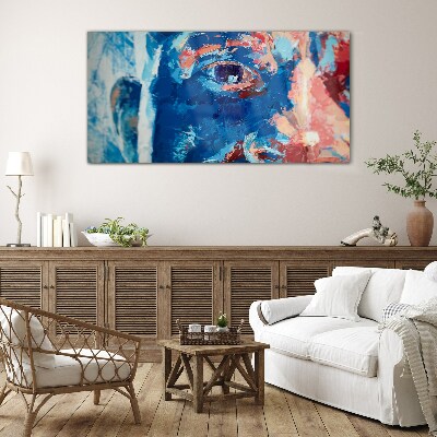 Tableau sur verre Visage intense aux nuances bleues