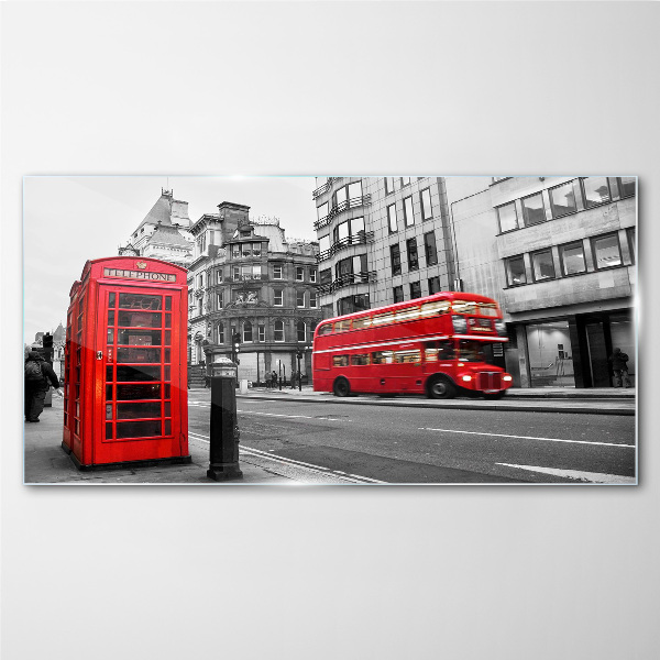 Tableau verre imprimé Un téléphone rouge dans une ville grise