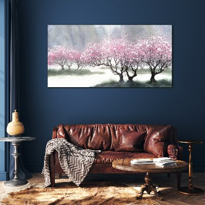 Tableau imprimé sur verre Arbres en fleurs dans la brume printanière