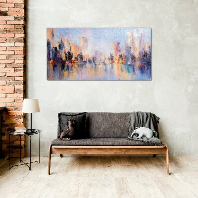 Tableau imprimé sur verre La ville dans la lueur du coucher du soleil