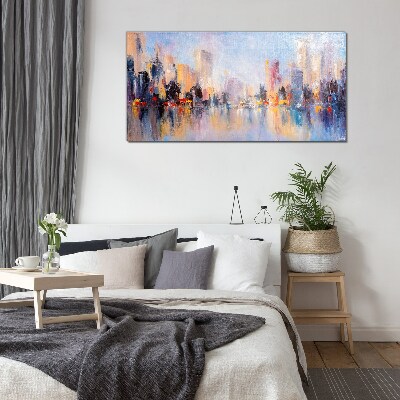 Tableau imprimé sur verre La ville dans la lueur du coucher du soleil